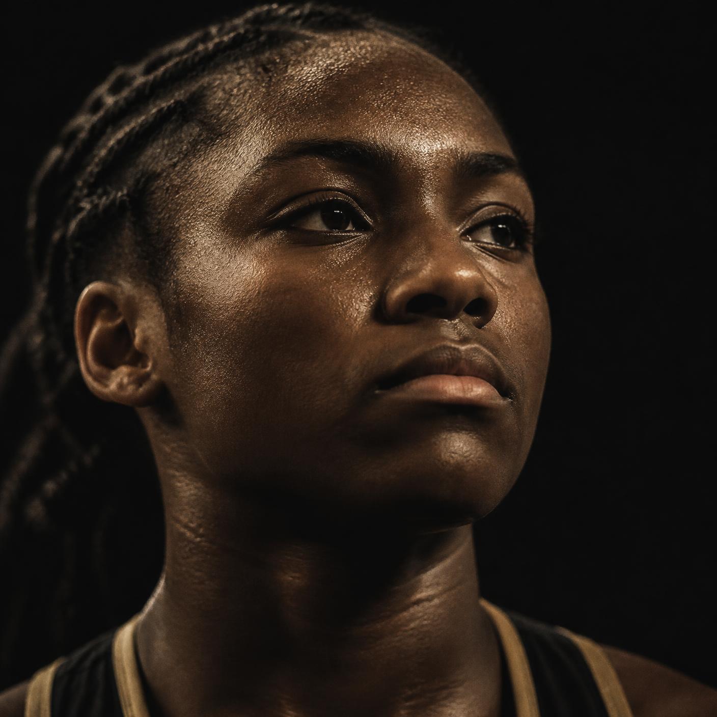 A teenage athlete composed and focused before competition